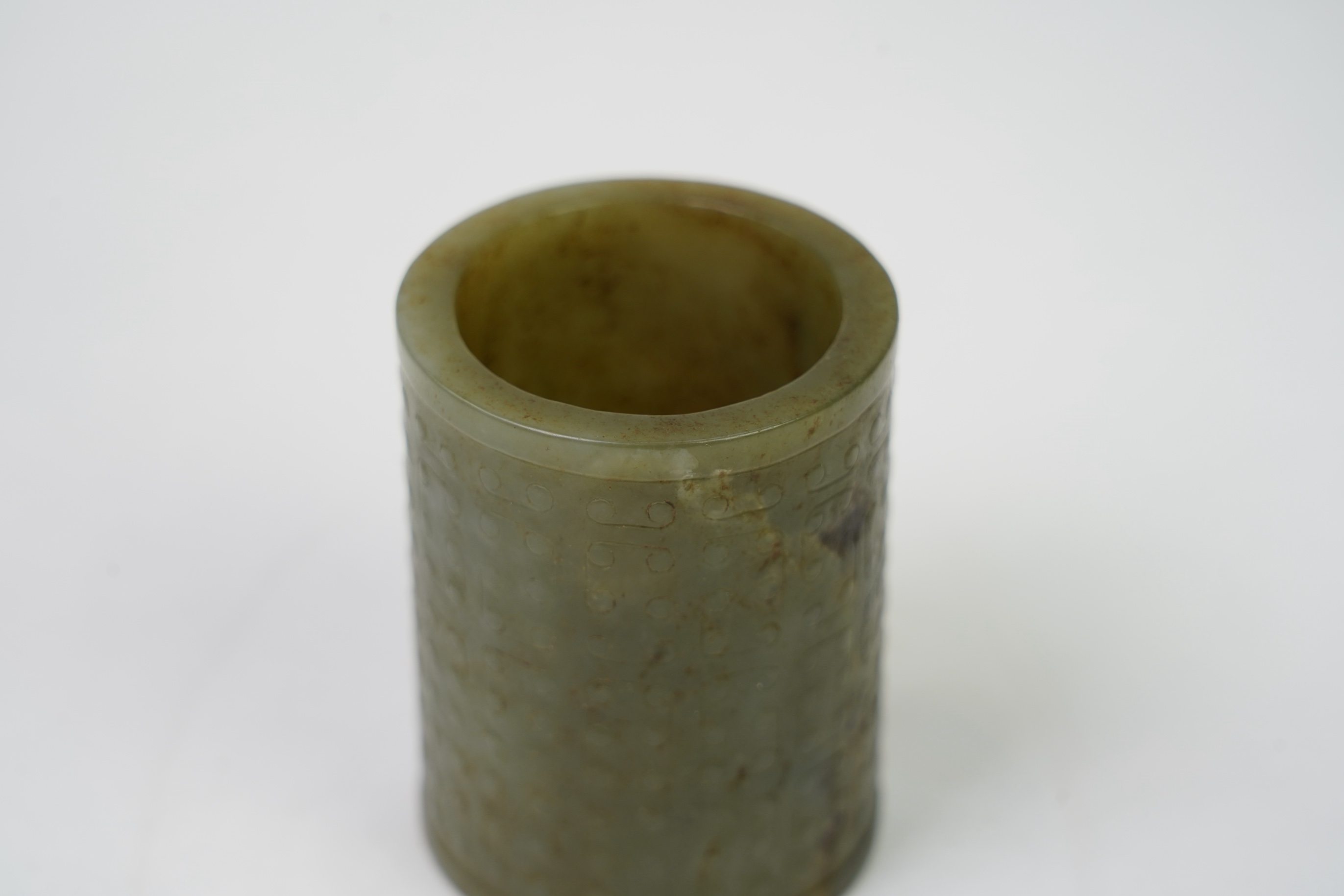 A Chinese green jade cylinder, Warring States period